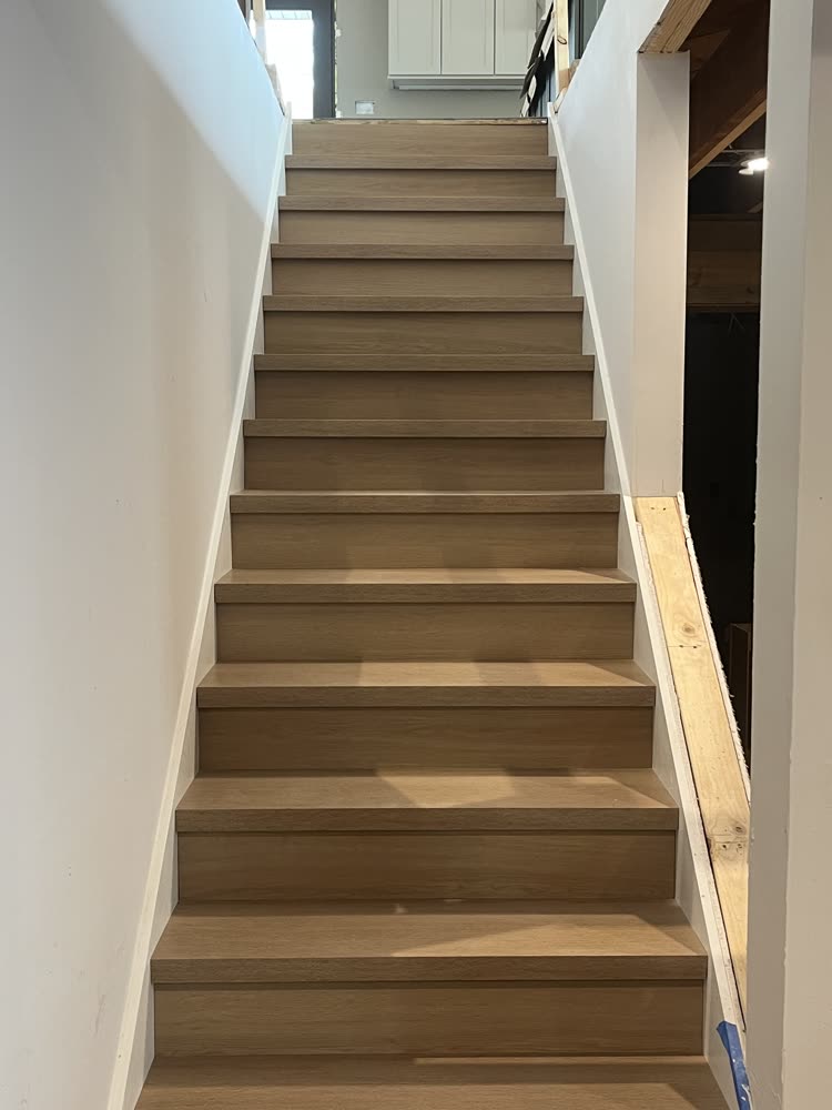 Staircase with new white oak treads and risers